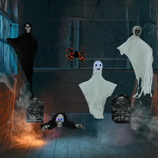 Hanging ghosts and cobweb from the outdoor Halloween decoration set