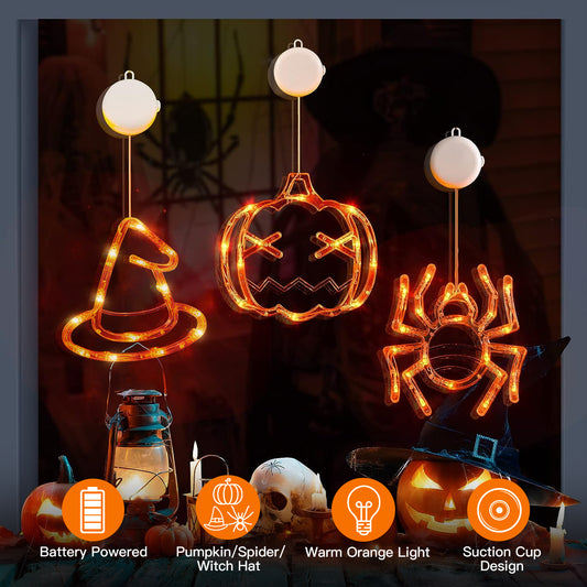 Halloween window lights shaped like a spider, witch hat and pumpkin