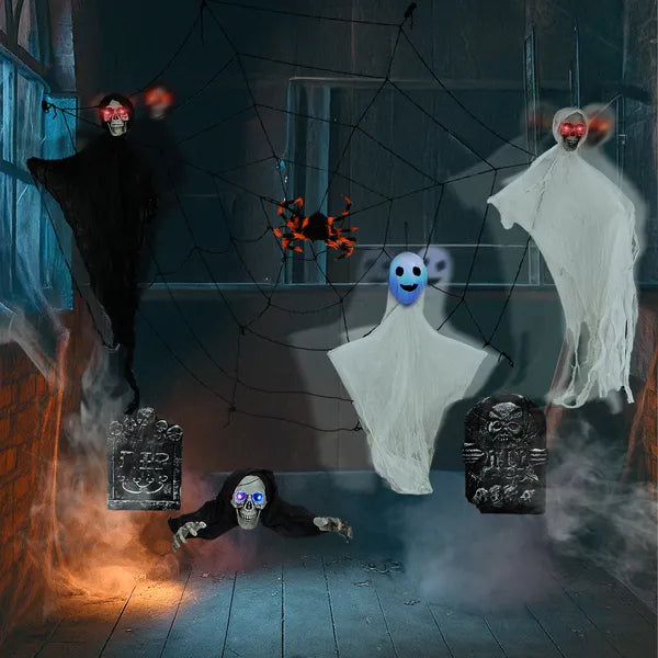 Swinging ghost decoration flying above a garden at night