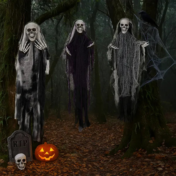 Close-up of a hanging skeleton ghost face in a black hooded robe